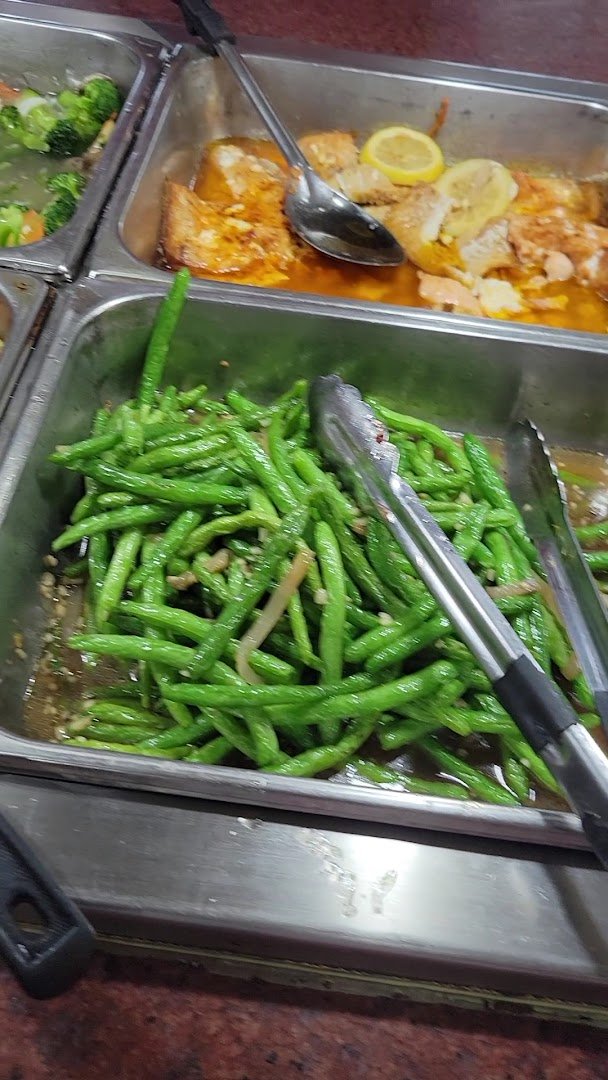Rows of hot food in a buffet line