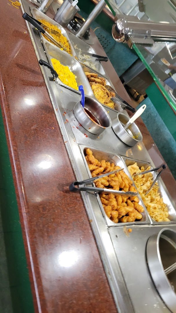 Rows of hot food in a buffet line